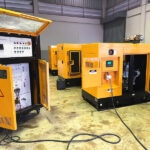 diesel generator connected to a portable load bank during load testing