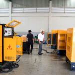 diesel generator load bank testing in factory workshop with portable load bank connected during commissioning